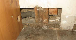 Timber framed cottage with timbers embedded behind the plasterboard