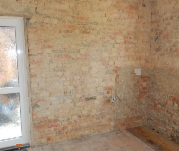Walls hacked off and ready for plastering